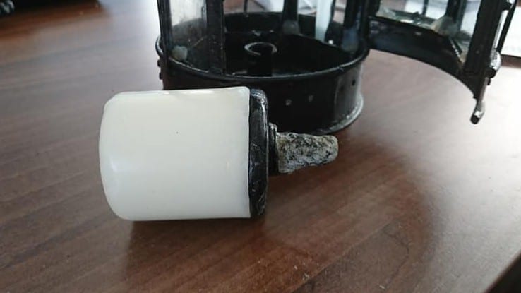 Epoxy putty used to repair a candleholder, part of a 19th century lantern